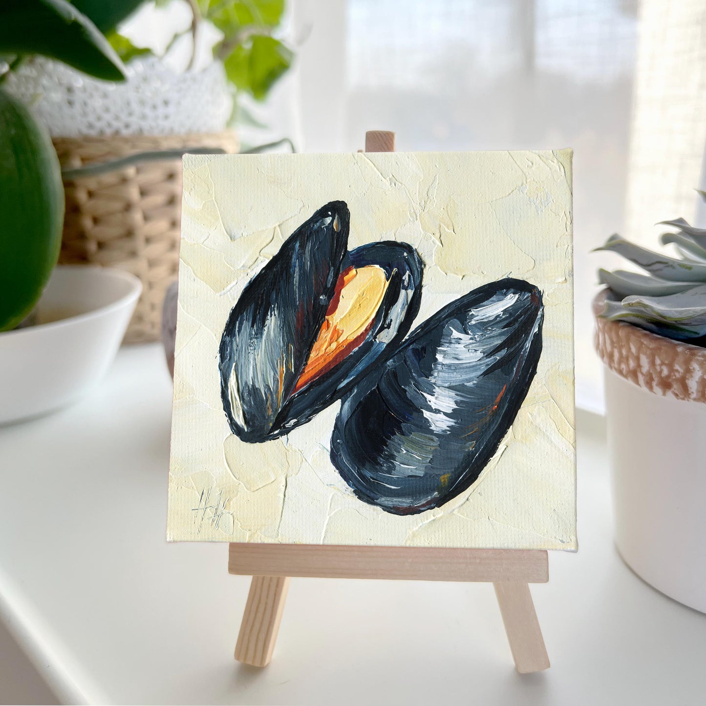 Detail shot of Hanna Hryharenka's mussel painting showing the dark glossy shells with warm orange interior tones, original mini canvas perfect for gourmets, coastal decor fans, and handmade art collectors