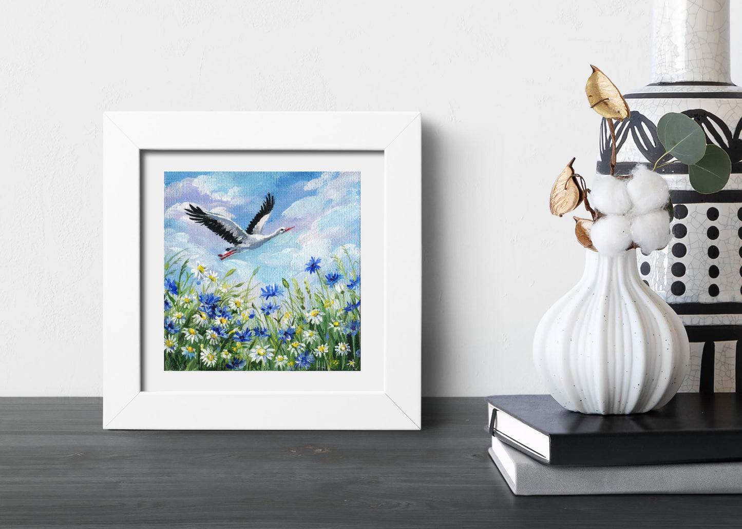 Stork flies over blooming field of daisies and cornflowers. Hand-Painted Mini Canvas Wildflower Meadow Art. Bird Lover Gift Original Artwork