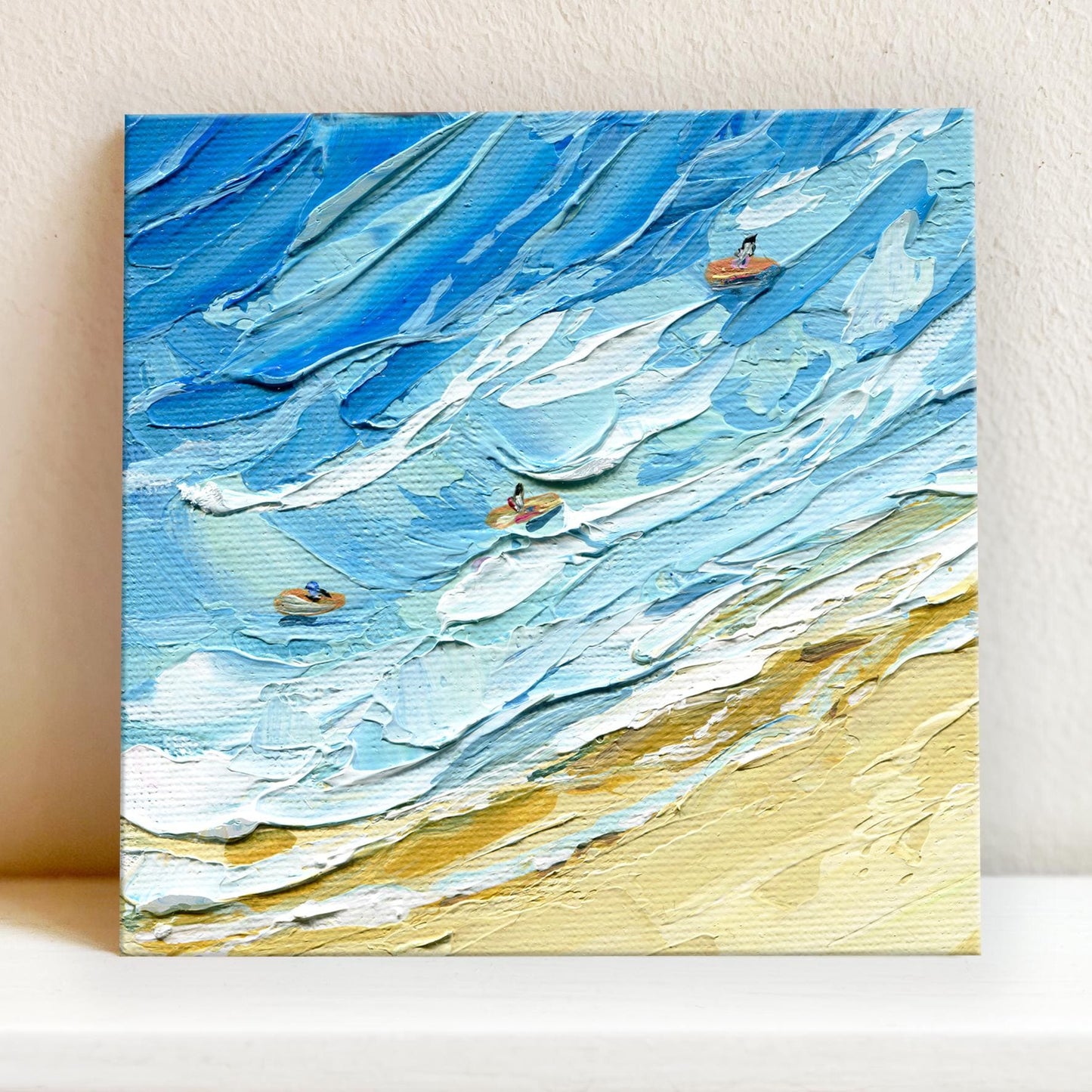 Detail shot of beach surf painting by artist Hanna Hryharenka showing the rich texture and depth of the ocean waves, with sunlight reflecting off the water's surface and white foam details, exclusive Hanna Art original