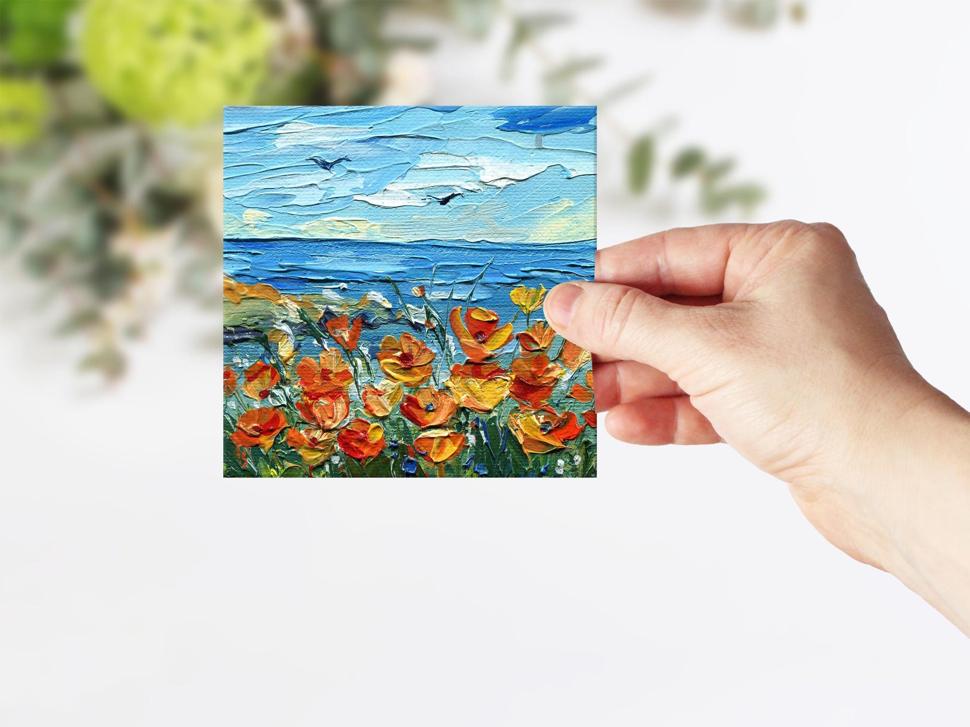 Macro shot of Hanna Hryharenka's California poppy composition revealing the burnished-gold petals with waves extending into distance, authentic miniature piece perfect for shore enthusiasts, Golden State admirers, and artisanal botanical art aficionados