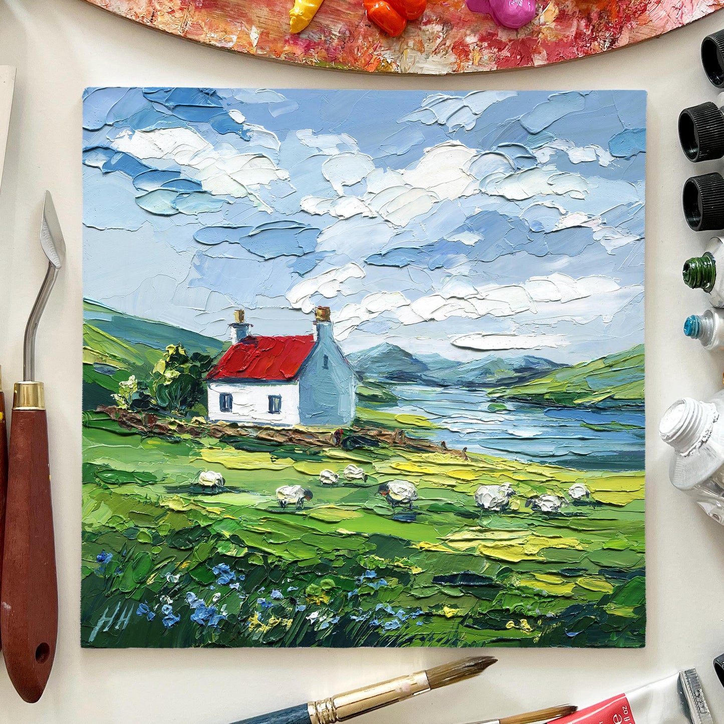 Scottish cottage oil painting with sheep, red roof landscape impasto art, palette knife textured countryside lake scene